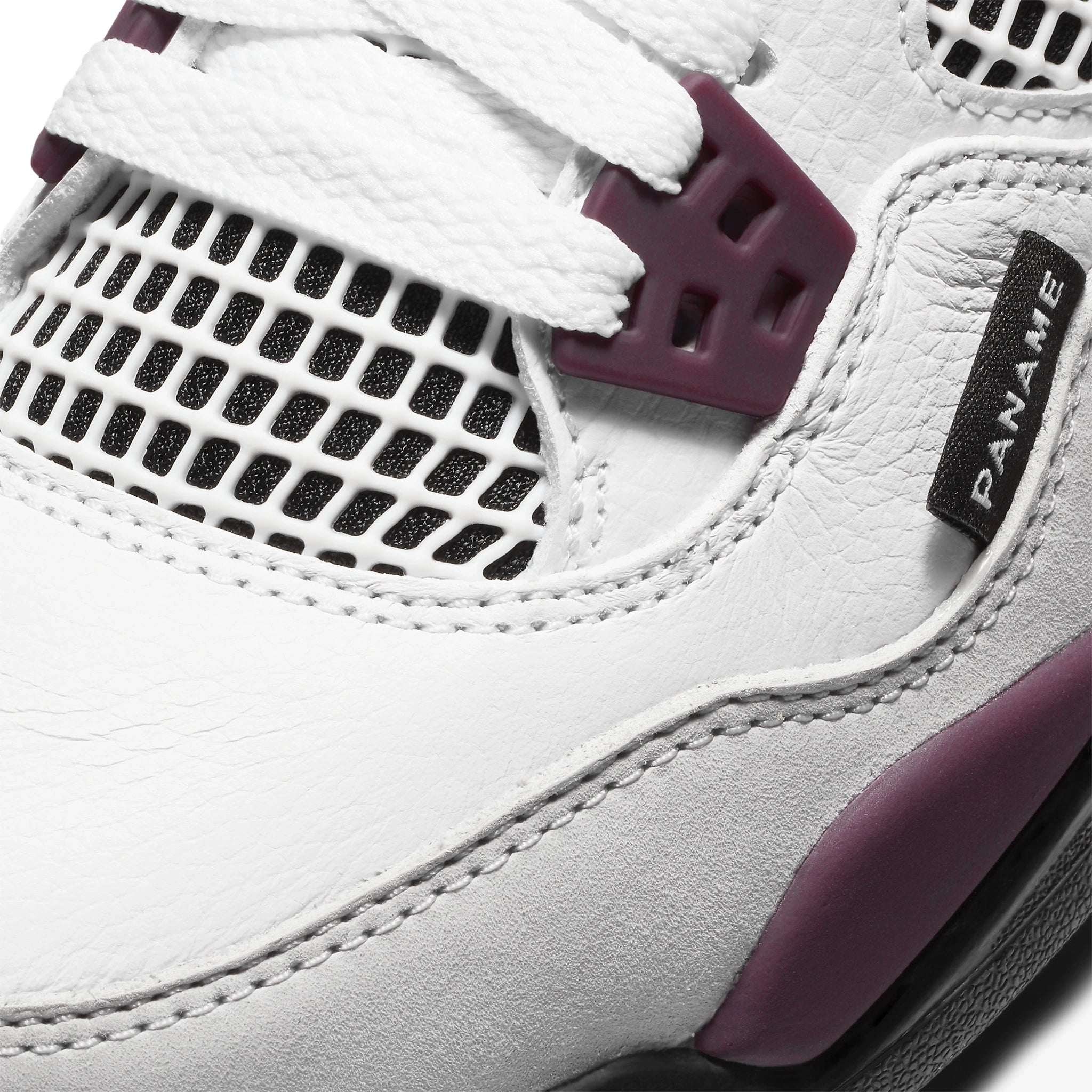 Toe box view of Paris Saint-Germain x Air Jordan 4 Retro Bordeaux (GS) CZ6509-100